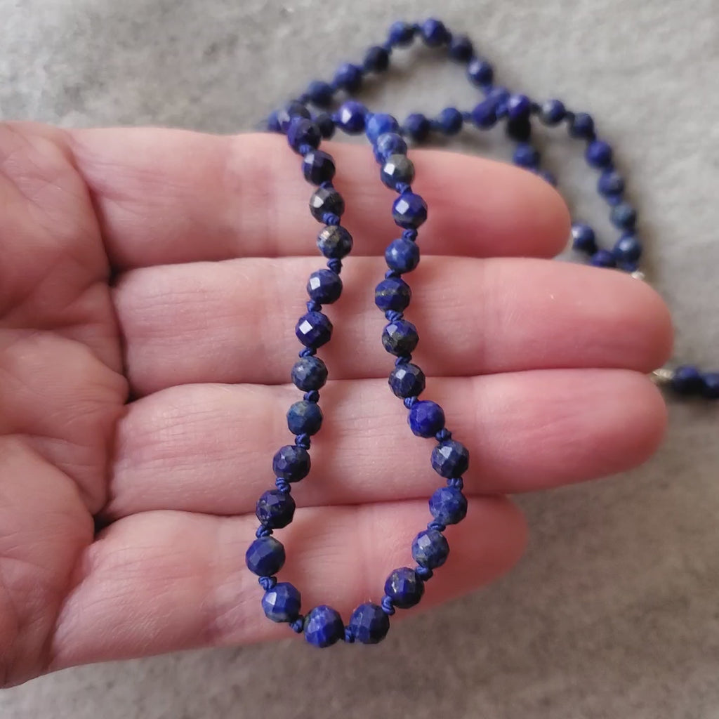 Lapis Lazuli hand knotted necklace in hand  video