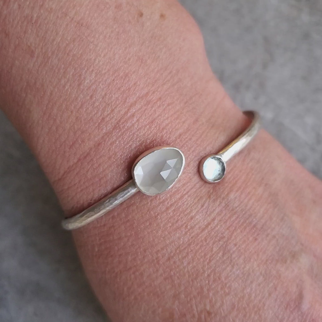 white moonstone and blue topaz cuff bracelet video on model
