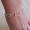 video of faceted Aquamarine sterling silver charm bracelet on model