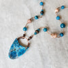 long silk  knotted Blue Apatite and sunstone necklace 