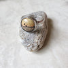 Chohua jasper silversmith ring on rock 