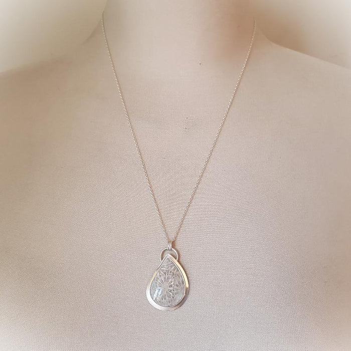 fossil coral freeform silversmith pendant on bust