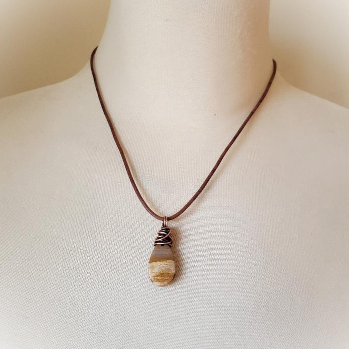 Petrified wood leather necklace on bust