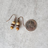 picture jasper copper stack earrings beside a quarter