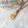 picture jasper teardrop pendant copper necklace on tile