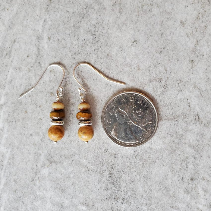 Picture Jasper  & Tiger Eye stack sterling silver earrings beside a quarter