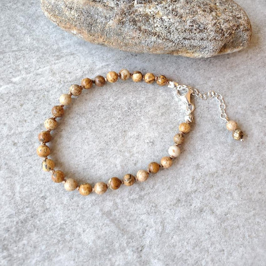 Picture jasper knotted bracelet on tile 