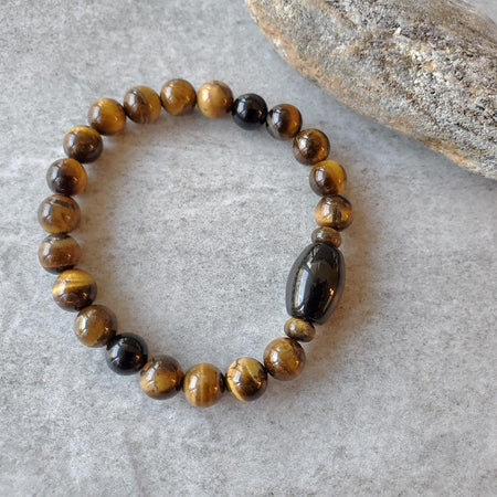 Tiger Eye Golden Obsidian stretch bracelet on tile