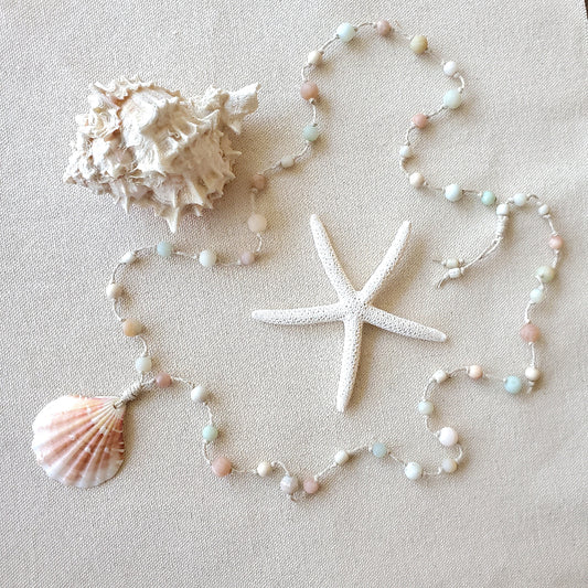 Hand knotted necklace with shell and gemstone