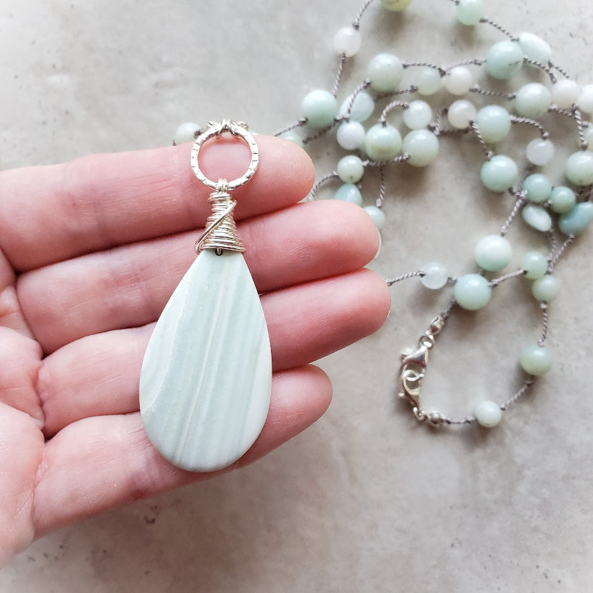 Green Lace Agate & Amazonite knotted necklace in hand