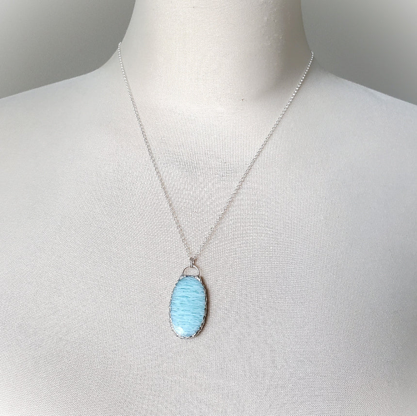 Amazonite oval pendant on bust 