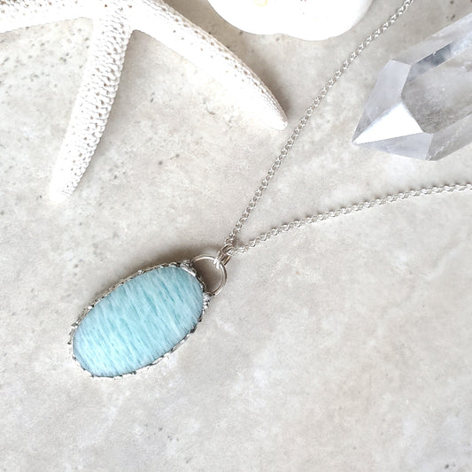 Amazonite oval pendant on tile