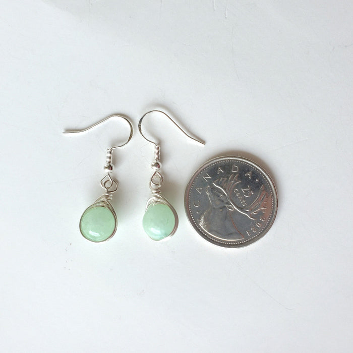 Burma Jade Herringbone wrap earrings beside a quarter