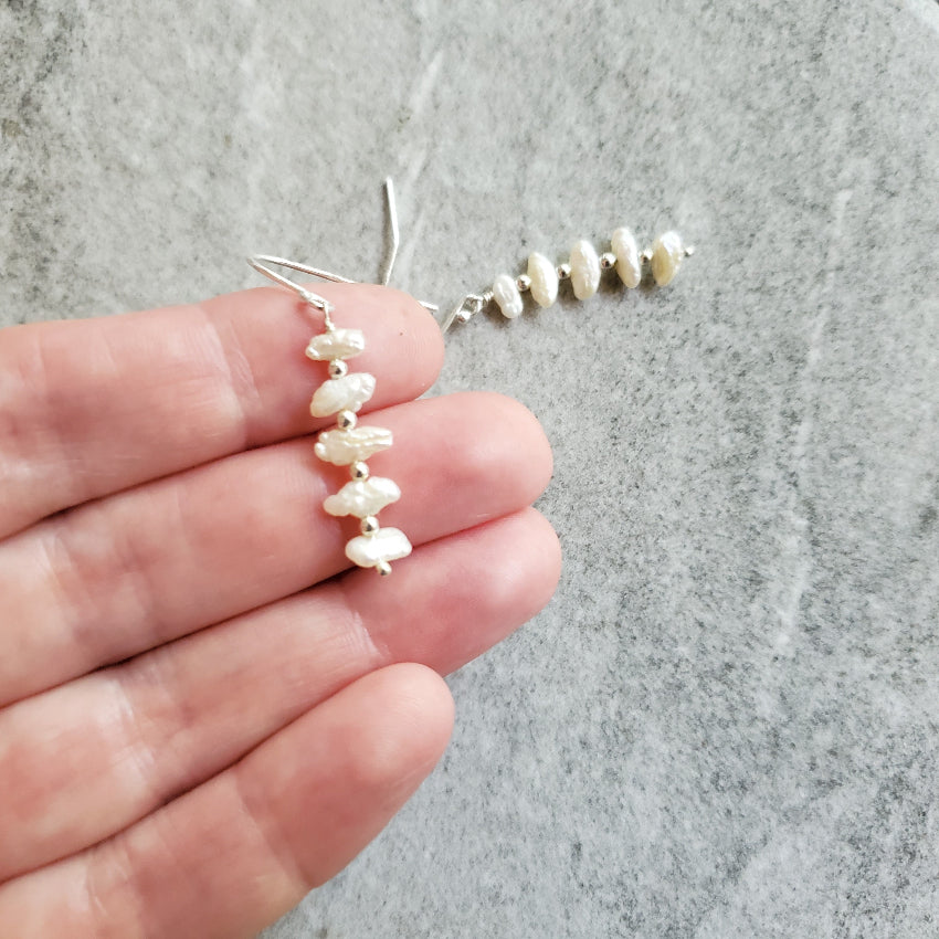 Freshwater Pearl stack earrings in hand