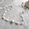 Mother of pearl and shell hand knotted necklace close up