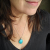 Morenci turquoise silversmith necklace on model