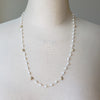 Mother of pearl and shell hand knotted necklace on bust