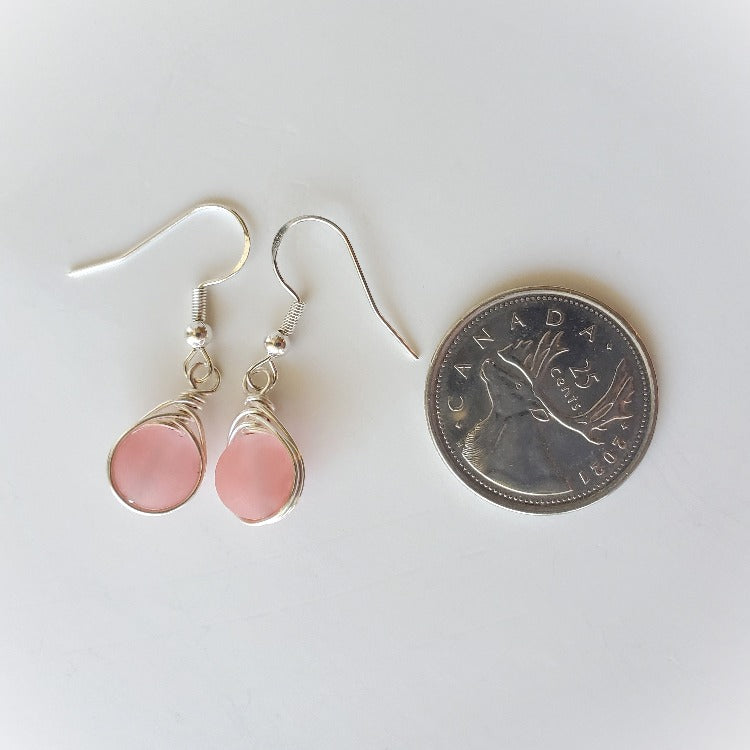 frosted Cherry Quartz herringbone earrings beside a quarter