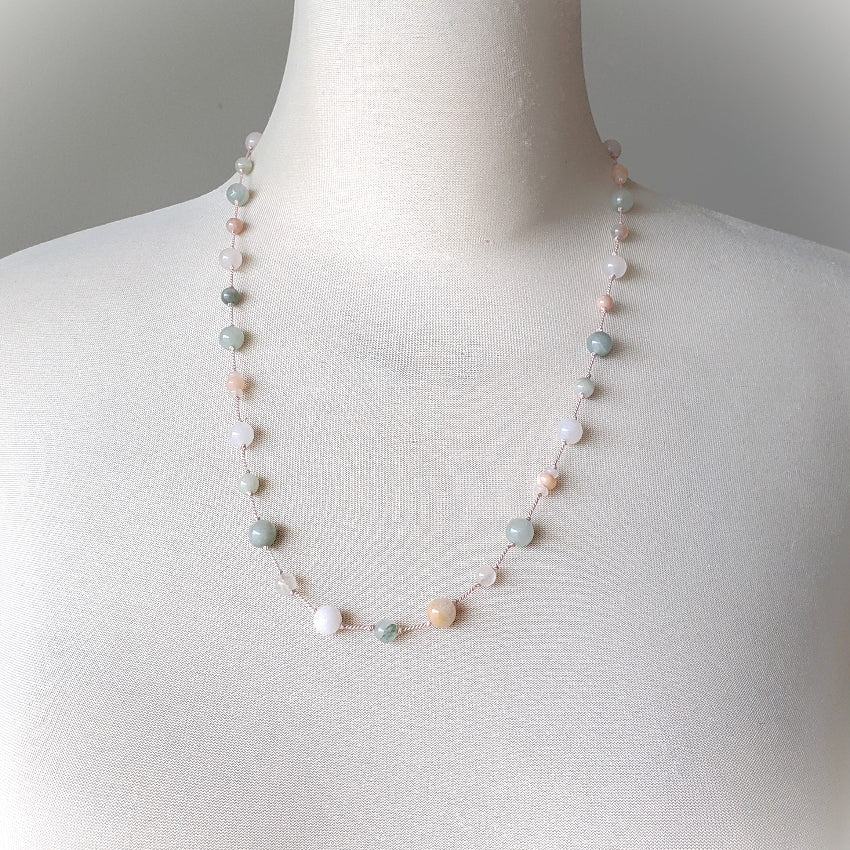 Necklace with multicolored beads on a mannequin