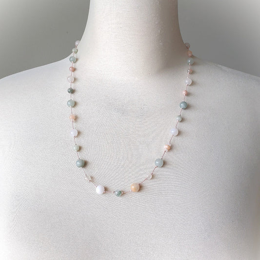 Necklace with multicolored beads on a mannequin