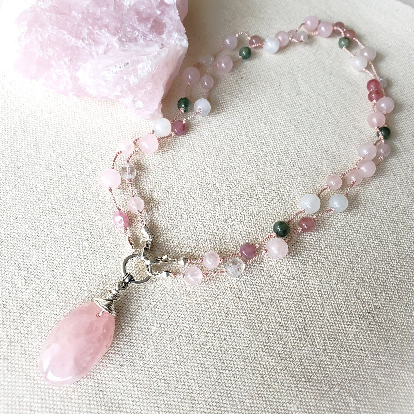 Rose Quartz knotted necklace on linen