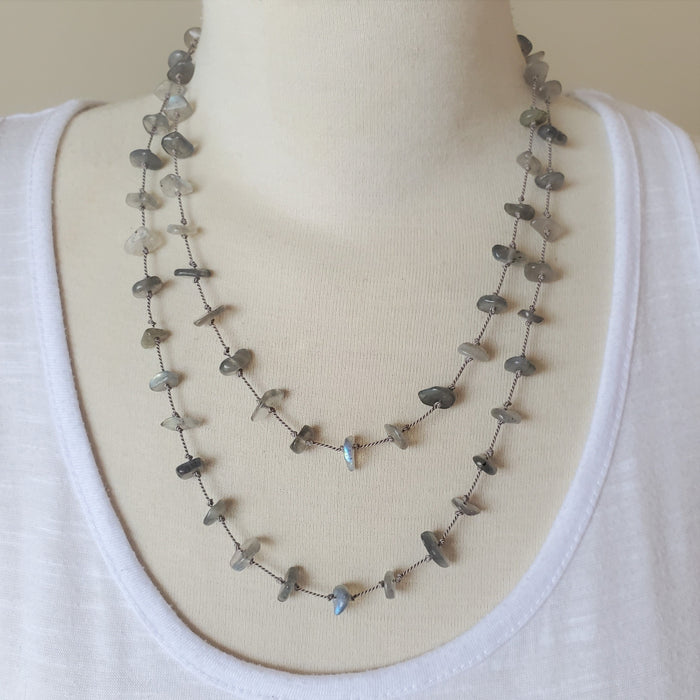 Long necklace of Labradorite chip handed knotted silk