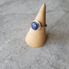 Lapis Lazuli silversmith ladies ring on wood stand
