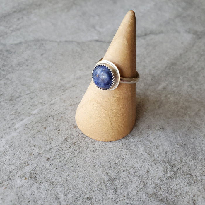 Lapis Lazuli silversmith ladies ring on wood stand