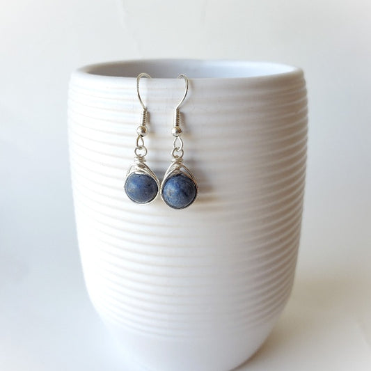 Blue fossil coral herringbone wrapped earrings hanging