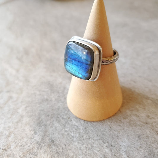 Labradorite silversmith ring on stand