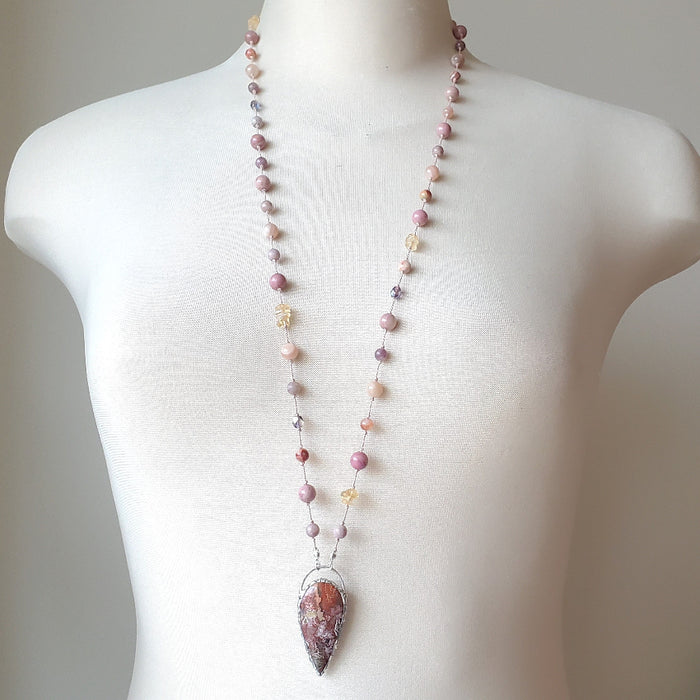 Crazy Lace Agate multi gemstone knotted necklace single strand on bust