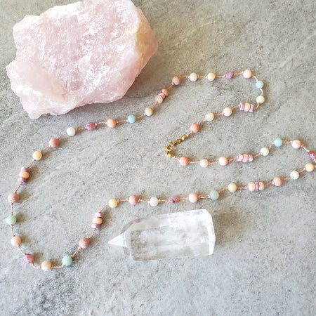 multi gemstone hand knotted necklace on tile 