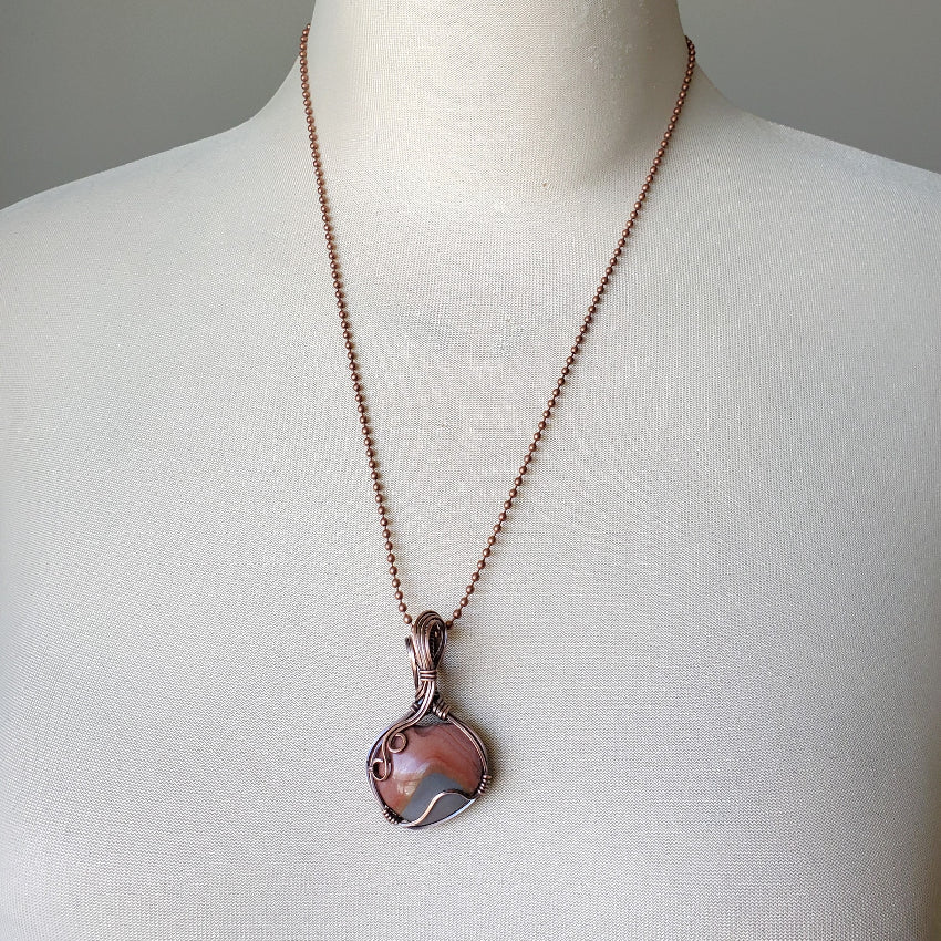 Polychrome Jasper wire wrapped heart pendant on bust