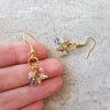 faceted Tourmaline cluster earrings in hand