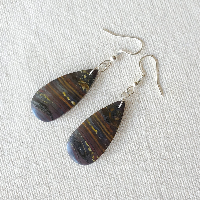 teardrop tiger's eye earrings on linen