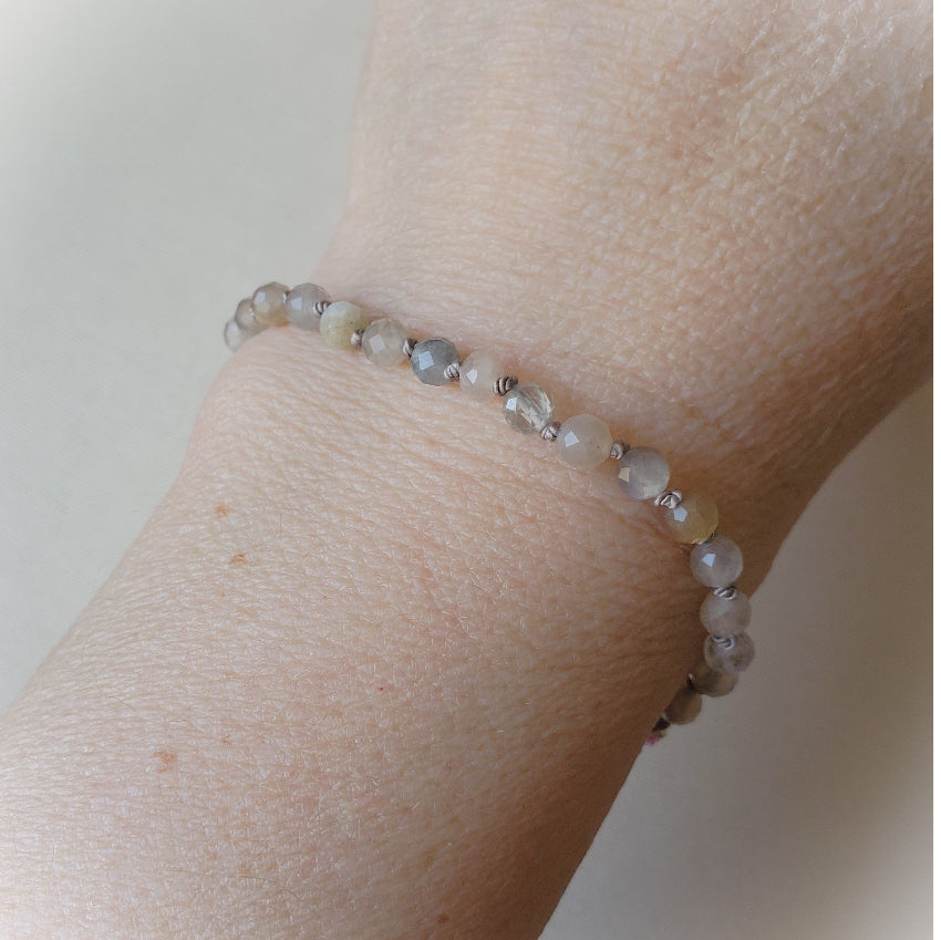 Faceted Grey Moonstone hand knotted bracelet on model