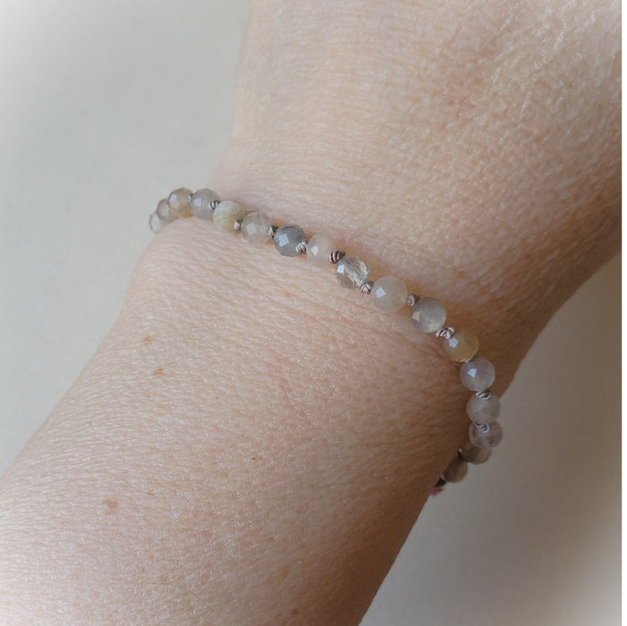 Faceted Grey Moonstone hand knotted bracelet on model