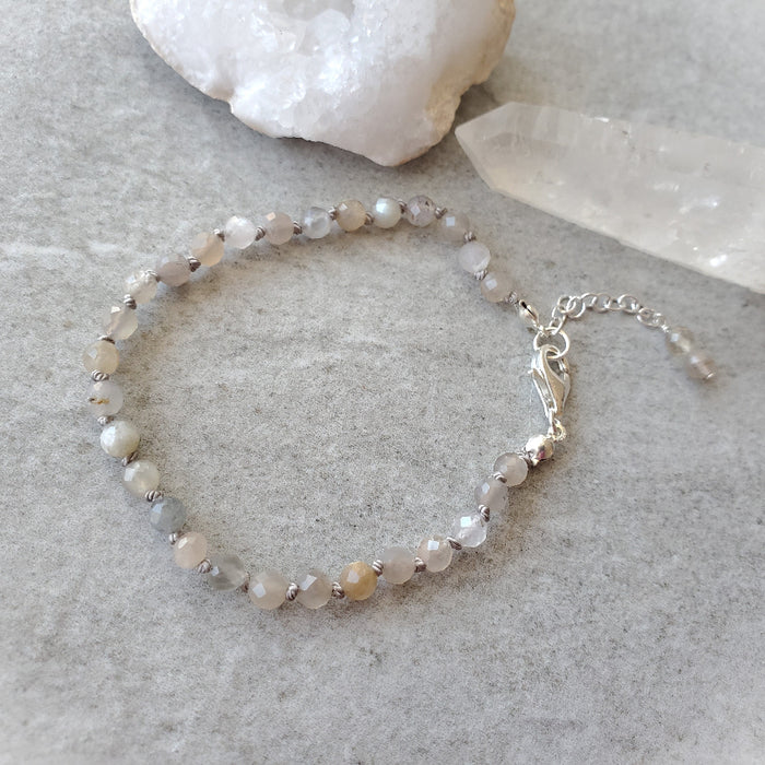Faceted Grey Moonstone hand knotted bracelet on tile