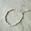hand knotted Bracelet with faceted Howlite beads