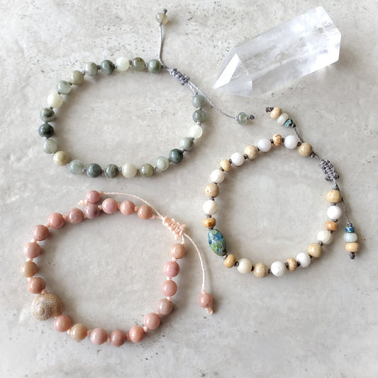 Knotted Gemstone bracelets on tile 