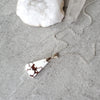 Wild Horse Magnesite pendant necklace on tile