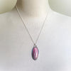 Rhodochrosite oval silversmith pendant necklace on bust