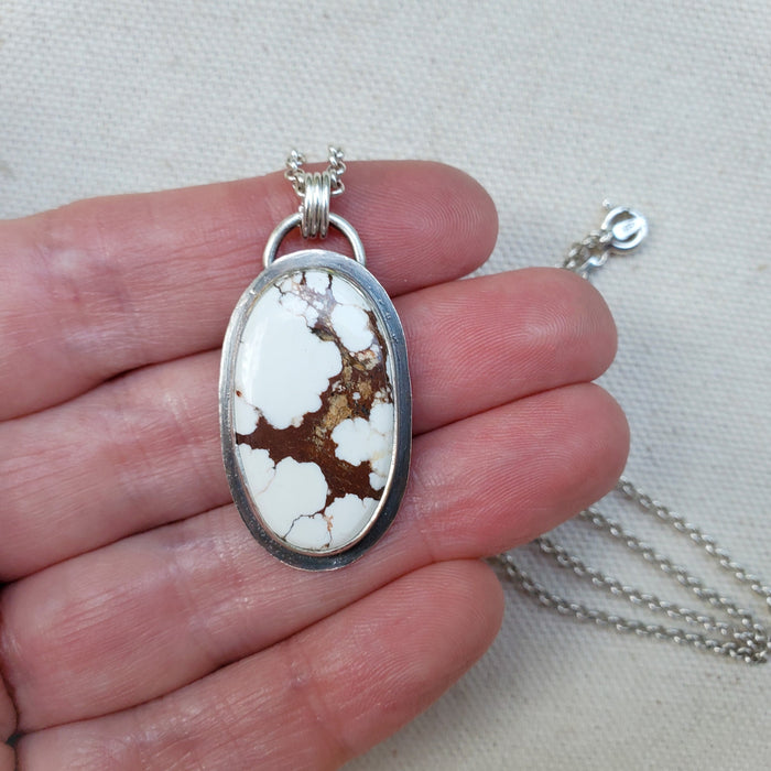Wild horse magnesite silversmith oval pendant