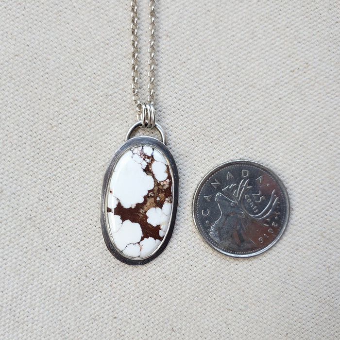 Wild horse magnesite silversmith oval pendant