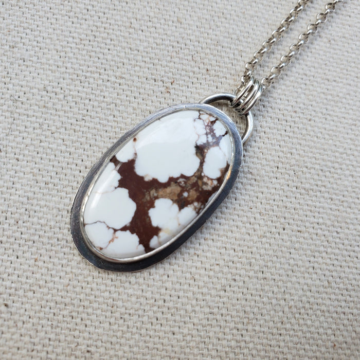 Wild horse magnesite silversmith oval pendant