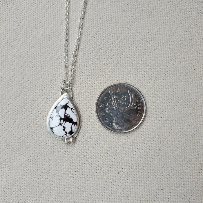 Teardrop wild horse magnesite bezel set pendant