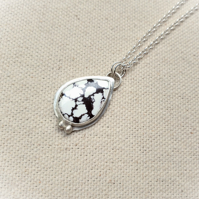 Teardrop wild horse magnesite bezel set pendant