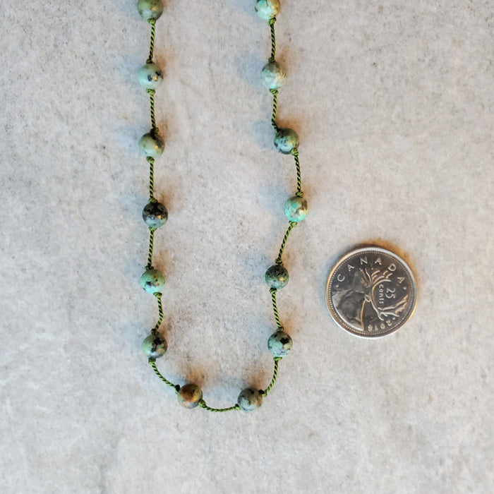 Hand knotted silk necklace with African turquoise