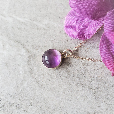 Round Amethyst pendant on sterling silver chain 