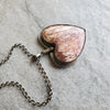 Bezel set Alunite heart gemstone pendant necklace  top view
